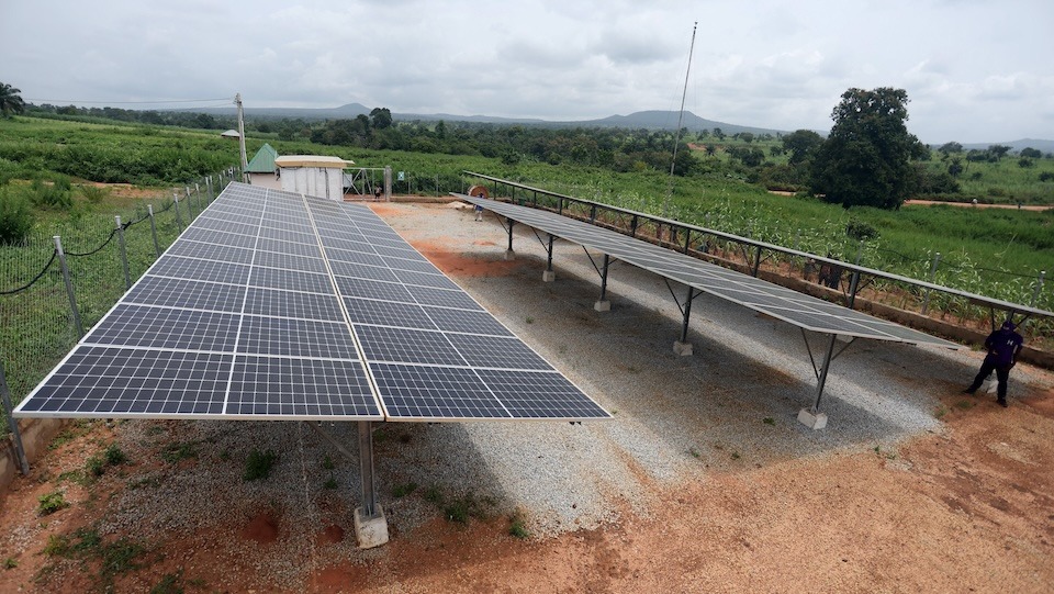 A general view of a hybrid minigrids station in Doma Town which is mainly powered by solar energy in Doma, Nassarawa State, Nigeria on October 16, 2023. Mini-grids -- small power stations usually supplying rural communities -- are not new. But the drop in solar technology costs over a decade has prompted a growth in clean energy minigrids with rural Africa poised to benefit the most. Nearly 600 million Africans live without electricity access, and in Nigeria alone that figure is 90 million or around 40 percent of the continent's most populous nation. And while Africa may have the most potential to generate solar power, according to the International Energy Agency (IEA), the continent lags behind installed capacity. Photo: Kola Sulaimon / AFP