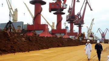 China will require licenses for some rare-earth exports to prevent security risks and weapon proliferation, not a total ban.