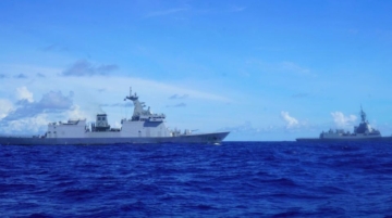 The Philippines says China amasses nearly 30 naval and coast guard ships in the South China Sea, a major surge in maritime presence.