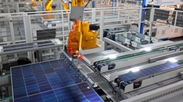 A robot arm produces solar modules at an energy production enterprise in Zaozhuang Economic Development Zone, in Shandong province, China, on February 20, 2025.Africa is building its solar manufacturing industry but reliance on China is inevitable. Photo by CFOTO / NurPhoto via AFP