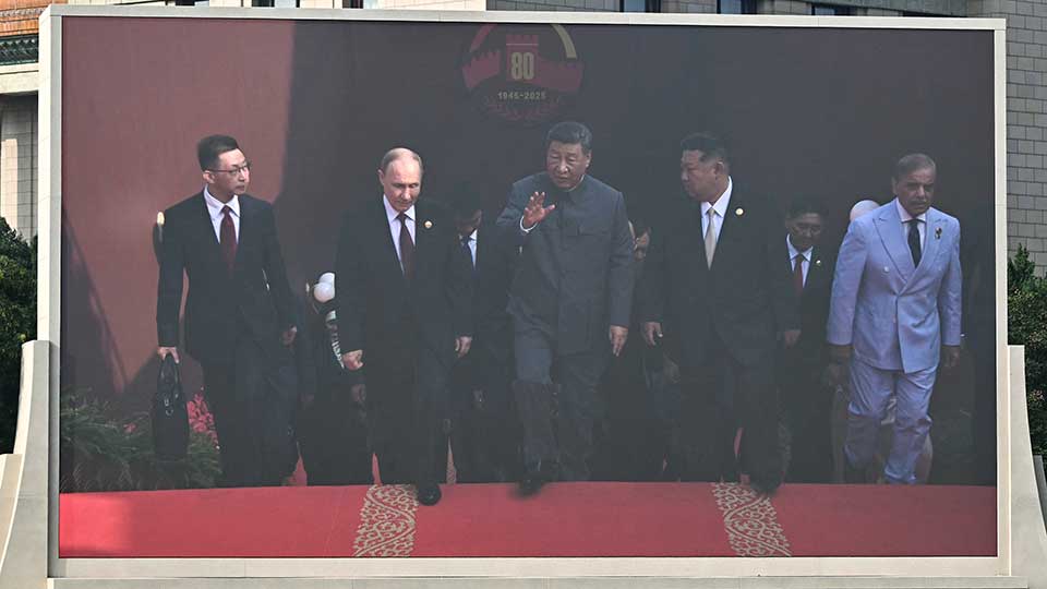 Kim, Putin at Xi’s Side for Massive China Military Parade