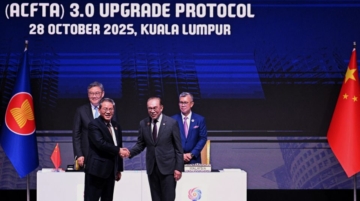 China urges ASEAN to stand with Beijing against “power politics” as both sides signed the ACFTA 3.0 trade pact in Kuala Lumpur.