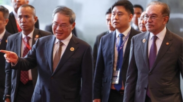 China urges ASEAN to stand with Beijing against “power politics” as both sides signed the ACFTA 3.0 trade pact in Kuala Lumpur.