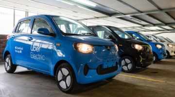 Some of the Henrey minicars that Uber Electric is rolling out in Johannesburg, South Africa. The company has partnered with Valternative to manage the fleet and provide charging services for the vehicles. Photo / Valternative