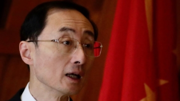 China urges ASEAN cooperation to ease South China Sea disputes while rejecting a 2016 arbitration ruling and facing new tensions.