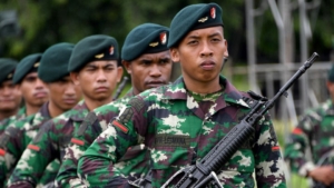 Indonesia is detaining dozens of Chinese nationals after an attack on soldiers at a gold mine in West Kalimantan, authorities said.