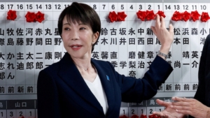 Japan's Prime Minister Sanae Takaichi, leader of the ruling Liberal Democratic Party (LDP), places a red paper rose on the name of an elected candidate at the LDP headquarters on general election day in Tokyo, Japan, February 8, 2026. The election comes as China-Japan tensions rise. Photo / REUTERS/Kim Kyung-Hoon