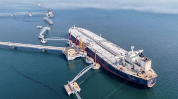 An oil tanker is docked unloading crude oil at the port in Qingdao, in China's eastern Shandong province, on March 25, 2026. (Photo by CN-STR / AFP) / CHINA OUT