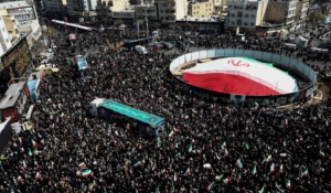 People gather for the funeral of Iranian security chief Ali Larijani and victims of the IRIS Dena warship at Enghelab Square, amid the U.S.-Israeli conflict with Iran, in Tehran, Iran, March 18, 2026. Majid Asgaripour/WANA (West Asia News Agency) via REUTERS ATTENTION EDITORS - THIS PICTURE WAS PROVIDED BY A THIRD PARTY.