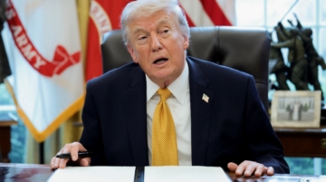 U.S. President Donald Trump speaks during an event to sign an executive order creating an anti‑fraud task force headed by U.S. Vice President JD Vance in the Oval Office at the White House in Washington, D.C., U.S., March 16, 2026. REUTERS/Jonathan Ernst