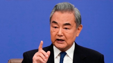 A March 8 file image of Chinese Foreign Minister Wang Yi. Photo by IORI SAGISAWA / POOL / AFP