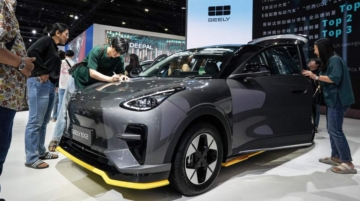 Visitors look at a GEELY EX2 electric car on display at the 47th Bangkok International Motor Show 2026 in Nonthaburi, on the outskirts of Bangkok, Thailand, on March 28, 2026. (Photo by Anusak Laowilas/NurPhoto) (Photo by Anusak Laowilas / NurPhoto / NurPhoto via AFP)