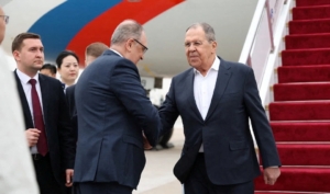 Russian Foreign Minister Sergei Lavrov shakes hands with Igor Morgulov, Russia's Ambassador to China, upon arrival at the airport in Beijing, China April 14, 2026. Russian Foreign Ministry/Handout via REUTERS ATTENTION EDITORS - THIS IMAGE WAS PROVIDED BY A THIRD PARTY. NO RESALES. NO ARCHIVES. MANDATORY CREDIT.