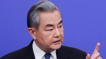 Chinese Foreign Minister Wang Yi in Beijing in this March 8, 2026 photo. He said on Thursday that U.S. and Israeli attacks on Iran were a violation of international law. REUTERS/Maxim Shemetov