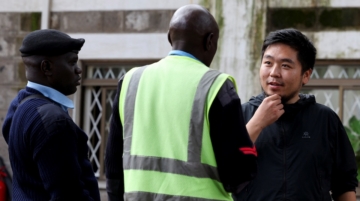 Chinese national Zhang Kequn stands outside the courtroom before his sentencing, after he pleaded guilty to charges of dealing with wildlife species without a permit and illegal possession of garden ants, on the day he was fined U.S. dollars 7,746 and a one year jail term, at the Jomo Kenyatta International Airport (JKIA) Law Courts, in Nairobi, Kenya, April 15, 2026. REUTERS/Monicah Mwangi