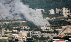 Smoke rises from the site of an Israeli airstrike that targeted the southern Lebanese village of Jarjouaa on May 13, 2026. Israel intensified strikes on Lebanon on May 13 with the health ministry reporting 12 people killed in attacks targeting cars, mostly south of Beirut, despite a ceasefire between Israel and Hezbollah. (Photo by Kawnat HAJU / AFP)